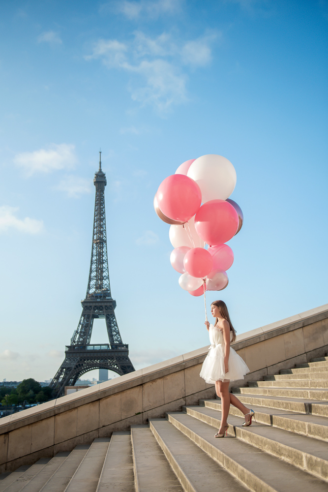 Individual portraits with colorful pink balloons at Eiffel Tower