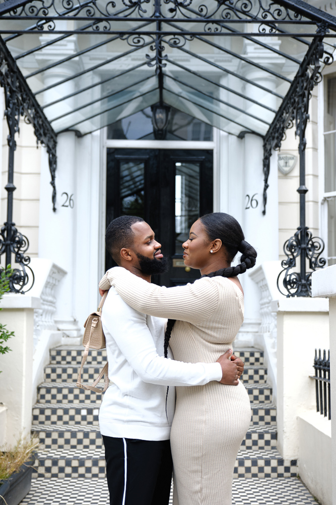 Newly engaged couple poses for engagement pictures in London