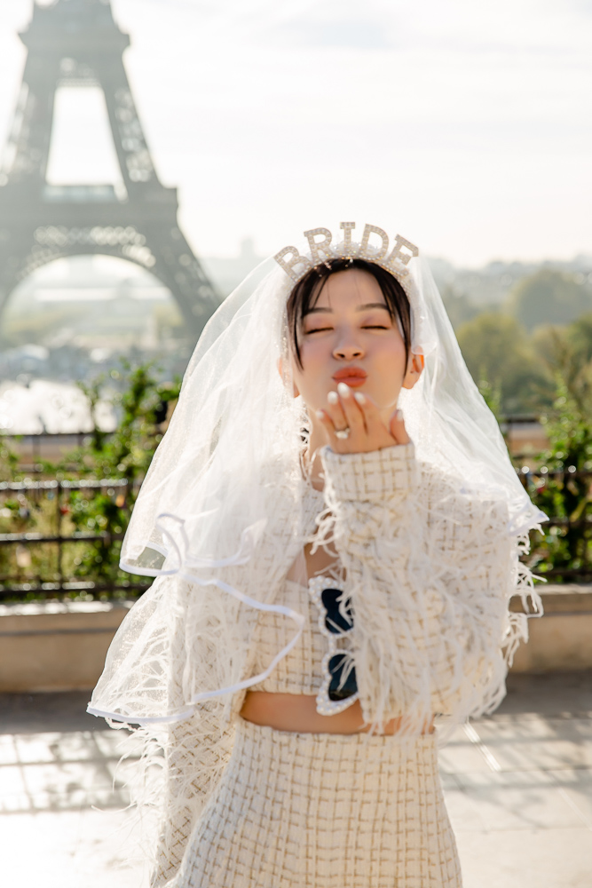 asian bride sending a kiss