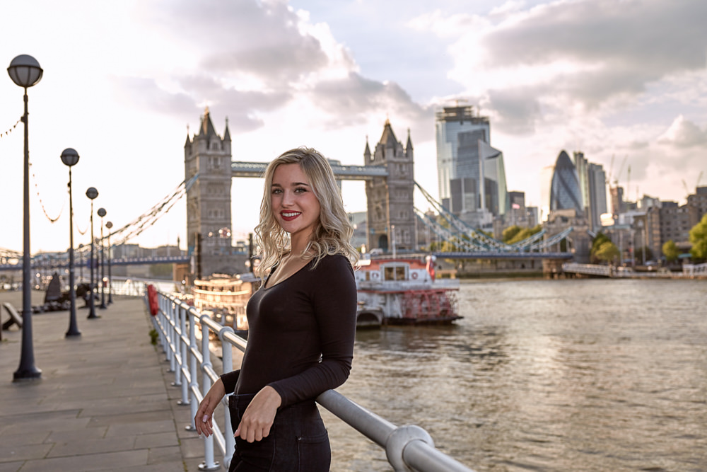 Beautiful blond girl poses for photos at sunset in London 2