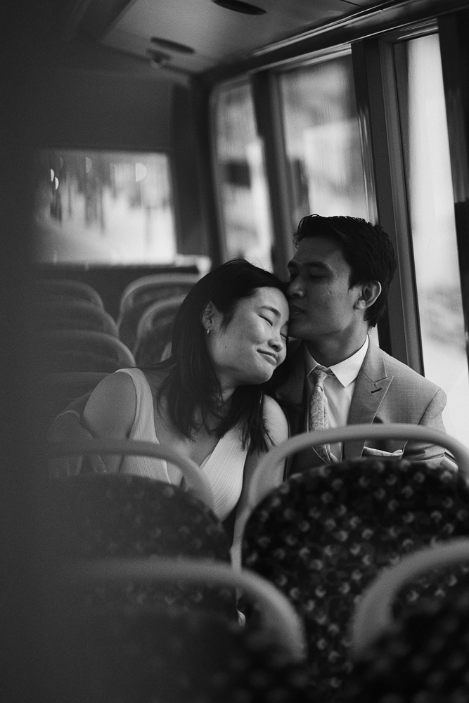 Couple in love having a romantic moment in a bus in London