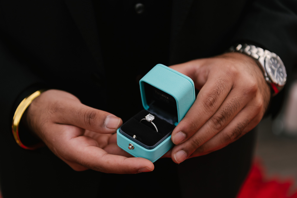 Man holding Tiffany & Co engagement ring