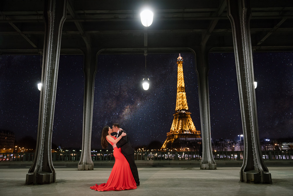 Chic couple having a romantic kiss in one of the most beautiful locations for couples photos Paris
