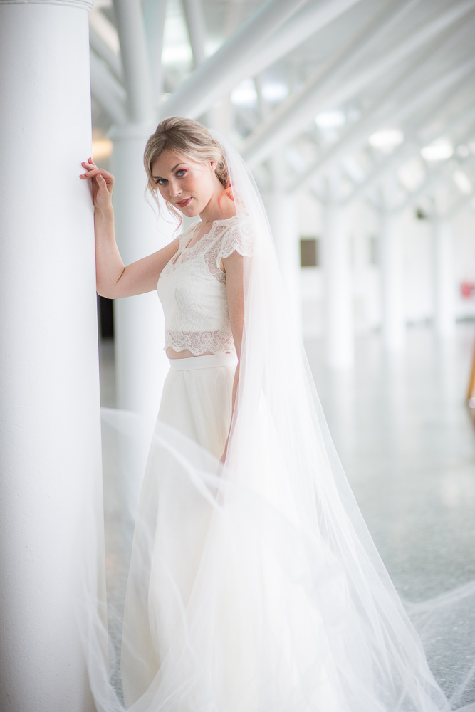 Bride posing showing her nice wedding dress- Photo by a Talented London Photographer 