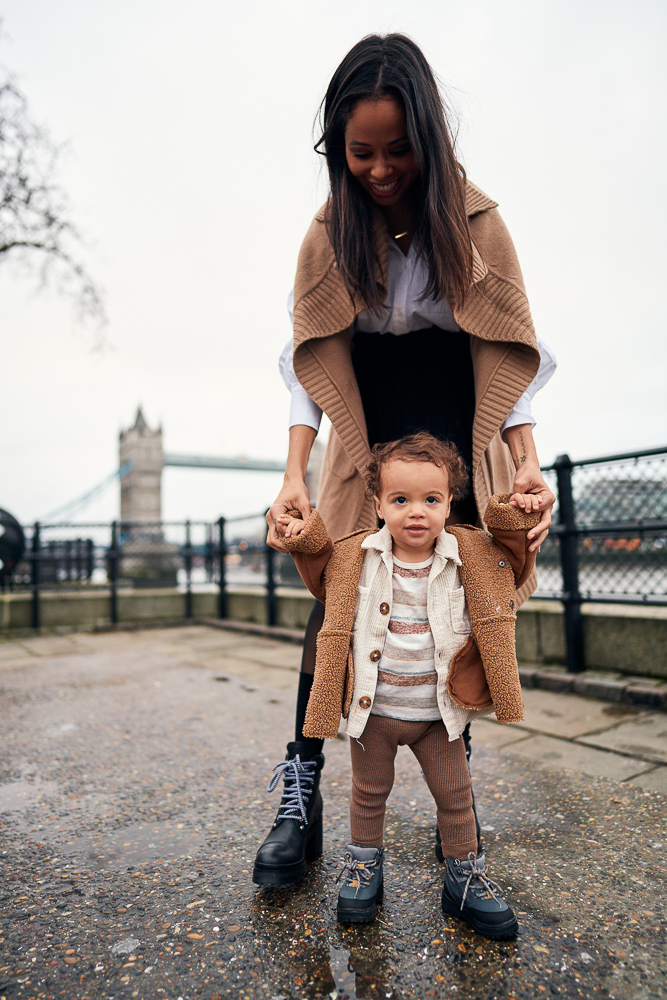 Mother and son enjoying their time near Tower Bridge in London