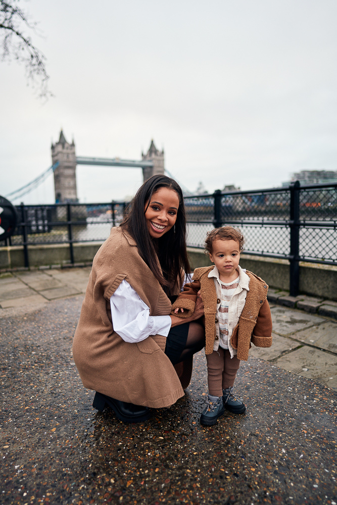 Mother with her baby boy during a photoshoot in London close to the Tower Bridge
