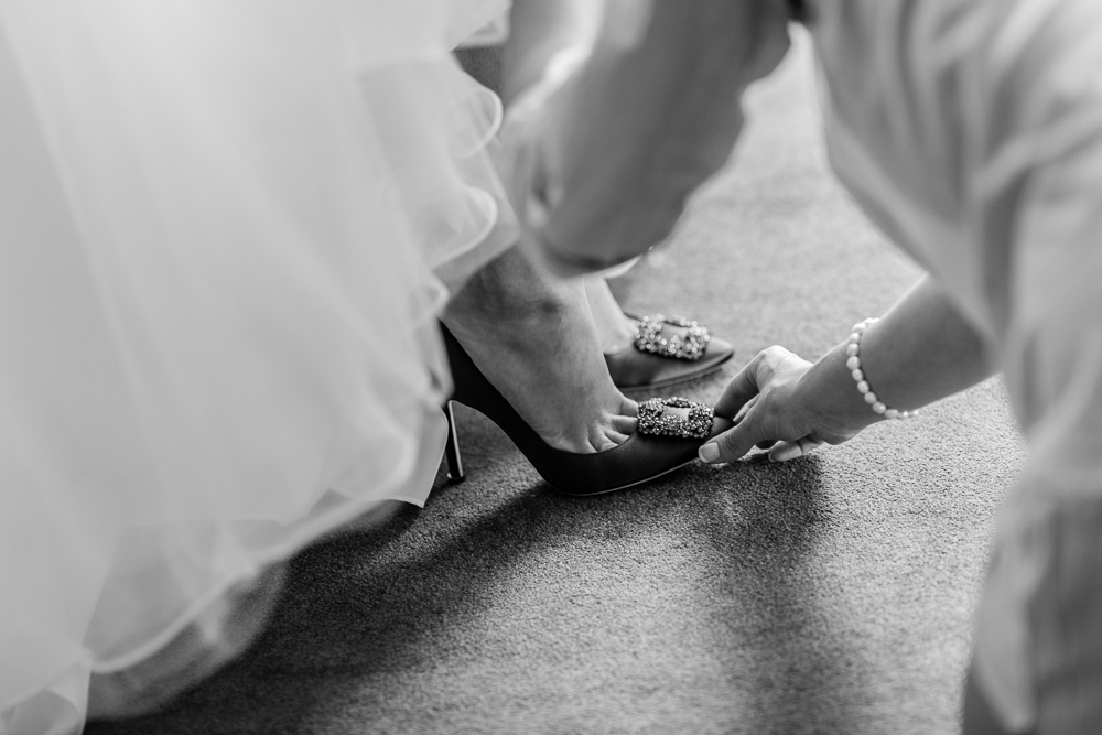 Detail shot of bride's preparation moment - Badgley Mishka wedding shoes