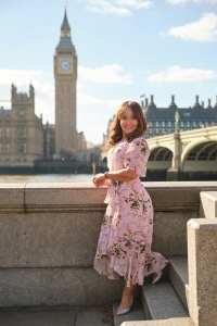 Portrait of a beautiful lady in front of Big Ben in London