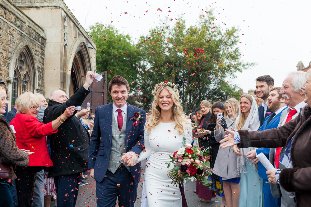 Bride and groom celebrating their London elopement with friends and family