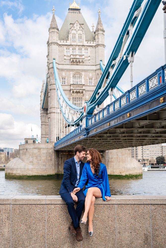 London Bridge Photographer - The Now Time - picture of a couple posing for professional photos in front of Tower Bridge