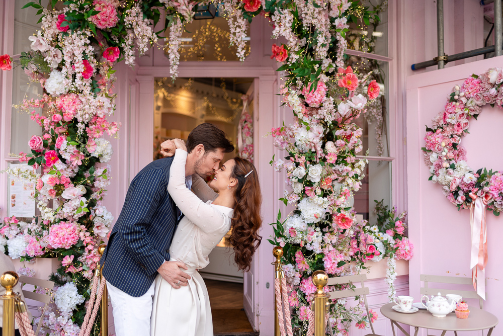 London photographer - The Now Time - couple sharing a romantic moment at Peggy Porschen in London Chelsea