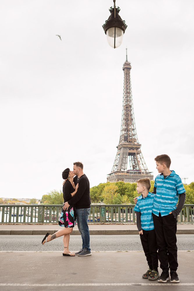 Fun family portraits in Paris France