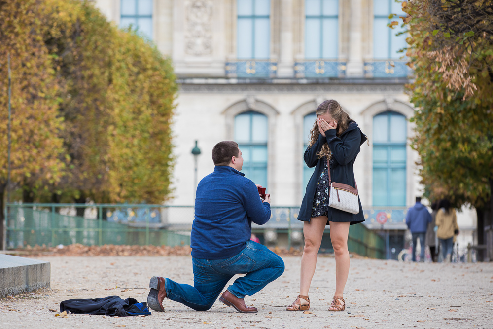 Public marriage proposal captured by a paparazzi  proposal photographer