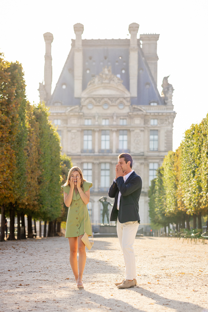 Woman happy after being proposed to in a beautiful garden