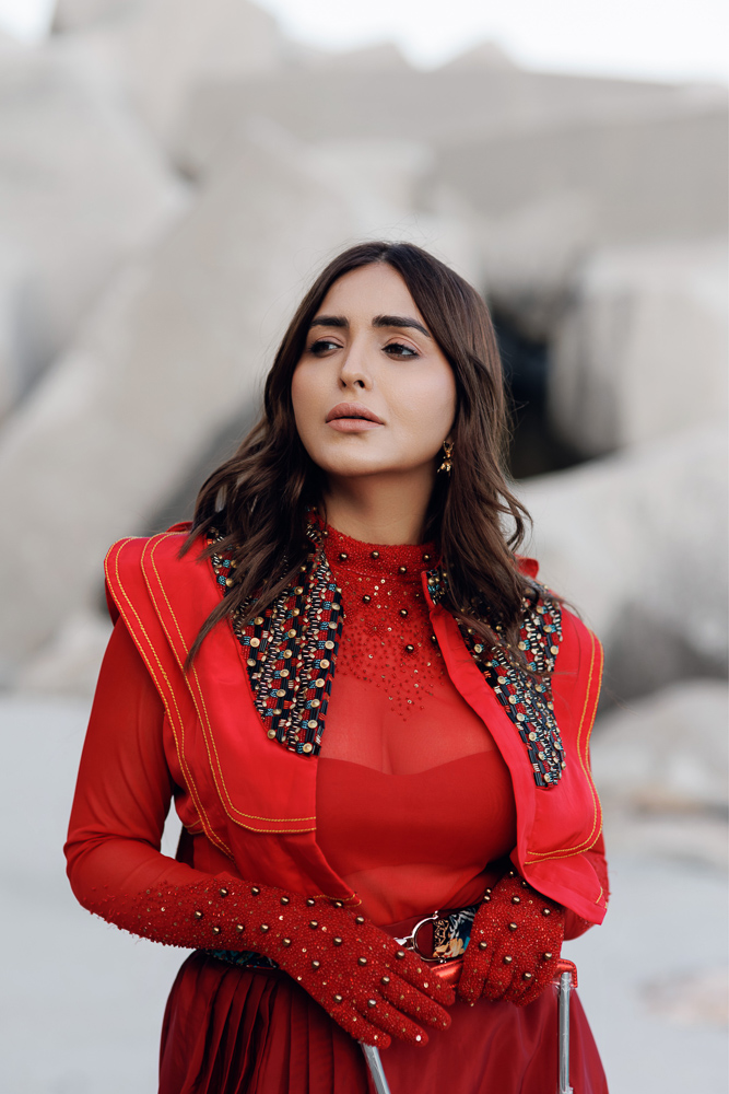 Solo portrait of a beautiful girl dressed in red on the French Riviera