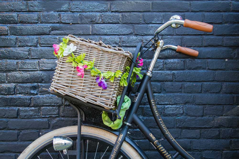 Bike with a basket of flowers in AMsterdam