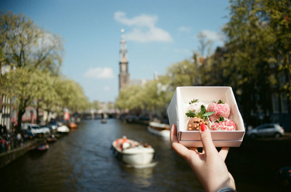 A view of a Amstel River channel and a box of cookies