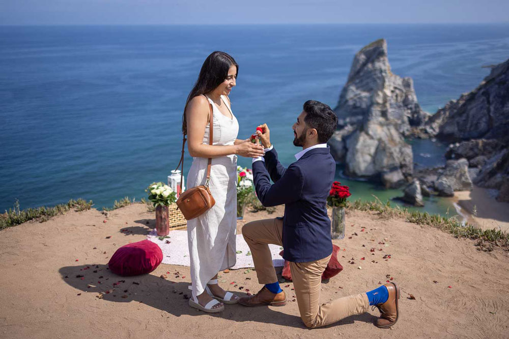 Man kneeling to propose near Lisbon